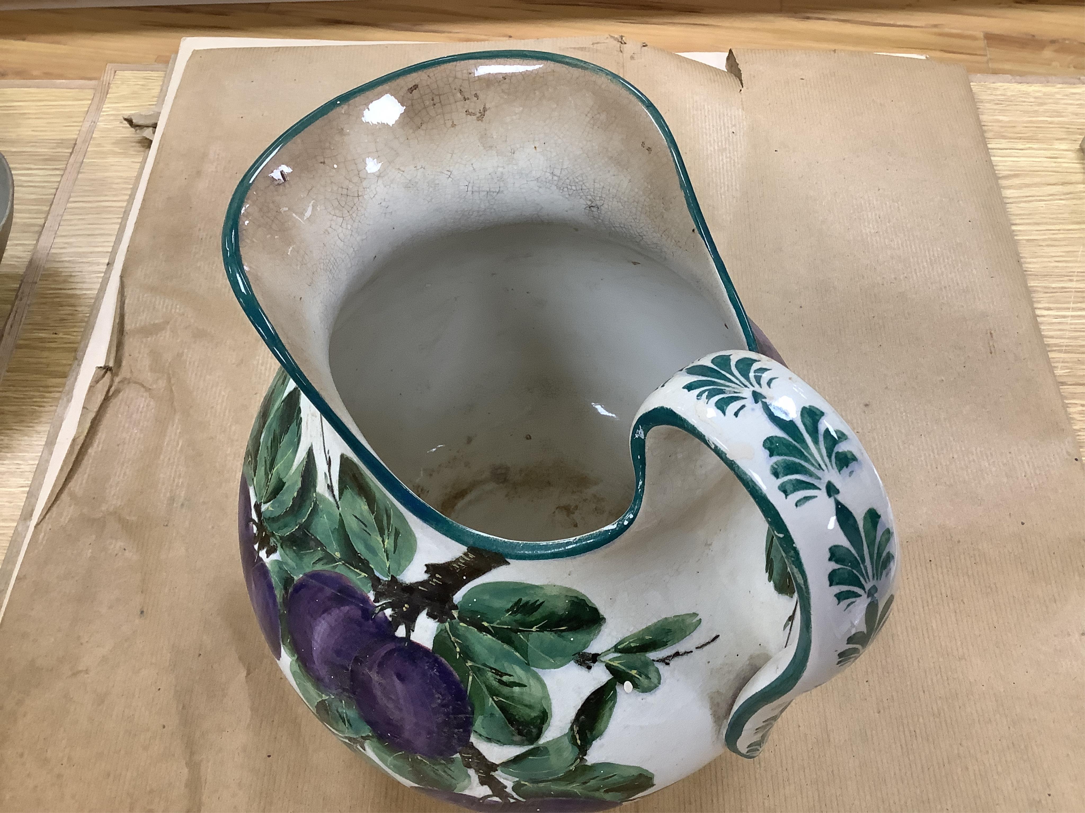 A Wemyss four-piece toilet set, a jug and basin, soap dish with liner, and bowl, damson pattern. Basin 39cm diameter., Condition - poor